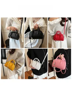 Collage of leather boston bags in five colors with litchi texture and metal charms