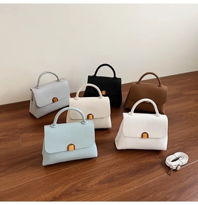 Litchi pattern leather handbags in six colors with metallic clasps and straps
