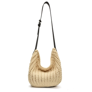 Hollow crochet knit shoulder bag in beige with adjustable black leather strap