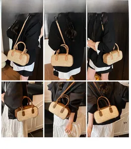 Woven straw Boston bag styled as handbag and crossbody on model in home setting
