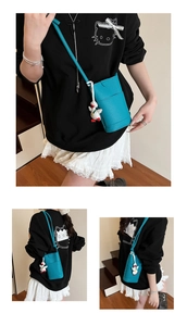 Blue lychee pattern leather crossbody phone bag featuring a white duck charm detail