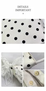 Dettaglio del tessuto a pois, fiocco in pizzo e chiusura magnetica della borsa da donna