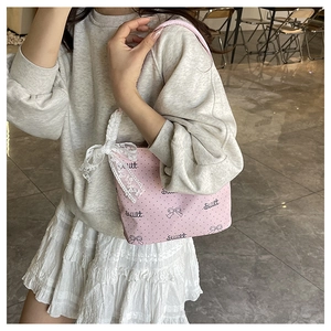 Borsa rosa a pois con scritta Sweet e grande fiocco in pizzo bianco decorativo