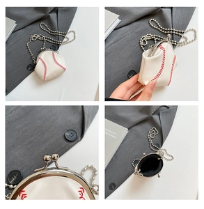 Detail view of mini baseball purse with red stitching, silver kiss-lock and bead chain