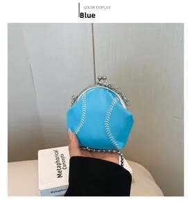 Detail of blue baseball-shaped mini coin purse with white stitching and silver ball chain