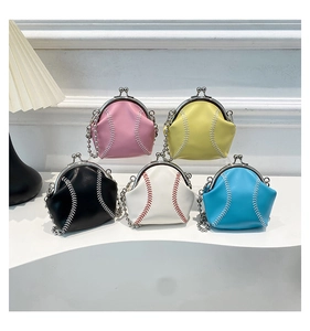 Detailed view of assorted baseball-themed shell bags with stitching and silver chain straps