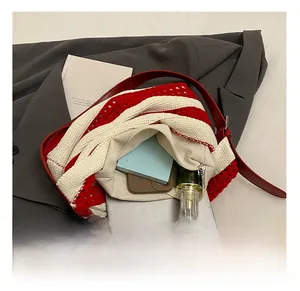 Top view of red and white striped knit tote bag showing spacious interior capacity