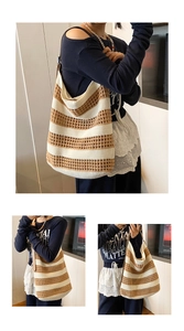 Detail view of contrast knit tote bag with hollow weave and leather shoulder straps