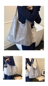 Macro view of silver large capacity tote bag with vintage texture and metallic finish