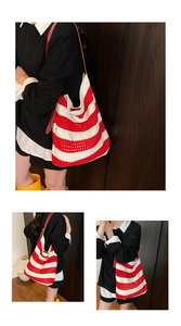 Close-up of red and white striped knit tote bag with delicate hollow mesh texture