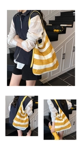 Detail of yellow and white striped crochet knit tote bag with soft wavy texture