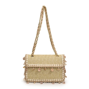Straw flap crossbody bag with pink shell charms and gold chain strap for beach vacations