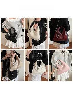 Collage of glossy patent leather handbags in diverse colors with chain straps and heart charms