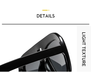 Close-up of polished black oversized sunglasses frame showing hinge and light texture
