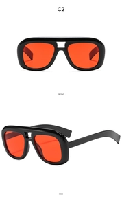 Detailed front and side views of oversized double-bridge sunglasses with orange lenses