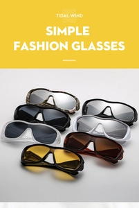 Détail de lunettes de soleil surdimensionnées en plusieurs couleurs au design tendance
