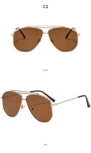 Detailed front and side view of gold double-bridge pilot sunglasses with brown lenses