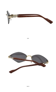Détails de lunettes de soleil sans monture avec branches en bois et accents dorés