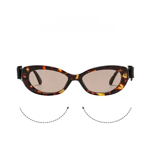 Détail de la monture en écaille et verres bruns sur lunettes œil de chat rétro