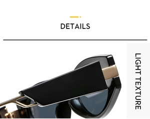 Detail of wide black sunglasses frame featuring golden metal hinges and light texture