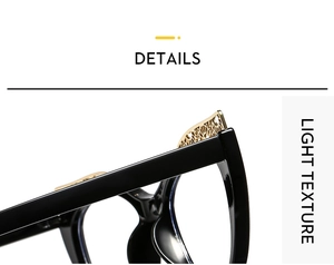 Close-up of black eyeglass frame featuring intricate gold hollow-out metal patterns