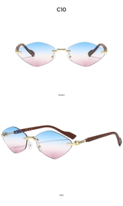 Détail de lunettes de soleil sans monture avec verres dégradés et branches effet bois