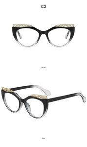 Front and side view of cat-eye frames with black to clear gradient and gold accents
