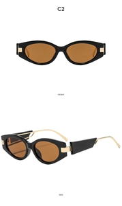 Detail view showing front and side angles of vintage oval sunglasses with gold accents