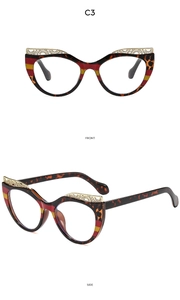 Detailed front and side view of cat-eye glasses with red-yellow stripe and leopard pattern