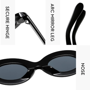 Detail view of oval black sunglasses showing secure hinges and integrated nose pads