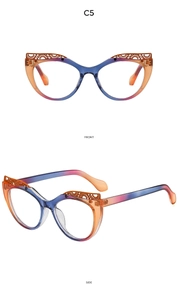 Detail of colorful gradient cat-eye glasses frame with intricate lace cut-out design