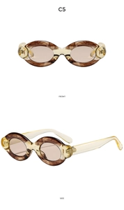 Oval bicolor sunglasses in amber marble finish with light yellow temples, front and side view