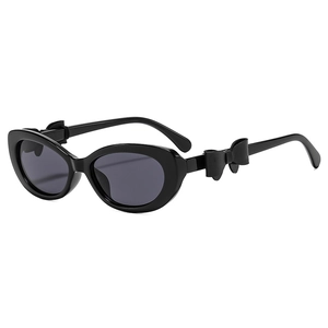 Lunettes de soleil œil de chat rétro Y2K noires avec nœuds élégants sur les branches