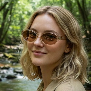 Retro oval cat eye sunglasses with transparent frames and light brown lenses for women