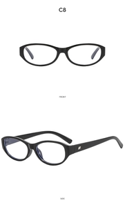 Detailed front and side view of black oval sunglasses with stylish metal accents