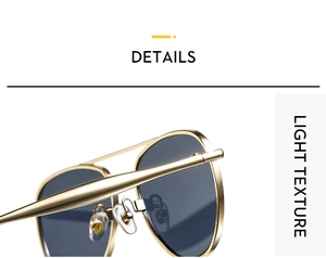 Close-up of golden metal aviator sunglasses with silicone nose pads and light texture