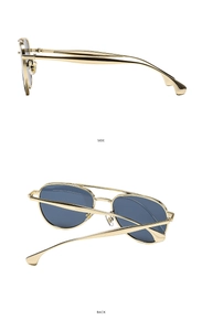 Detail view of gold metal double bridge aviator sunglasses with streamlined temples