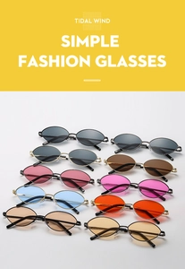 Close-up of vintage oval sunglasses in ten assorted lens colors and metallic frames