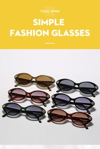 Détail de lunettes de soleil œil-de-chat vintage avec roses en métal sur la monture