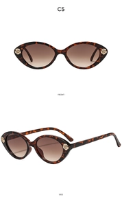 Lunettes de soleil œil de chat écaille de tortue avec détails de roses dorées en métal
