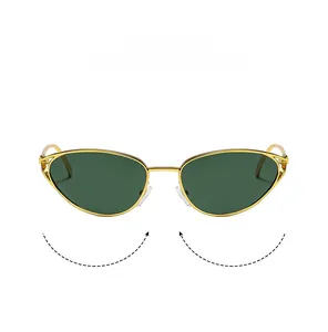 Detail view of gold metal cat-eye sunglasses featuring soft silicone nose pads