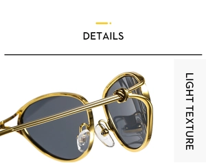 Close-up of golden metal frame sunglasses with decorative rope knot and clear nose pads