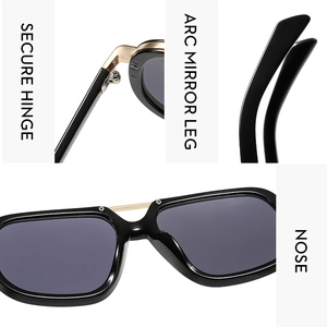 Detailed close-up of secure metal hinges and arc mirror legs on pilot sunglasses