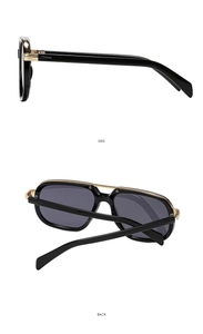 Detail view showing side and back of black pilot sunglasses with gold metal accents