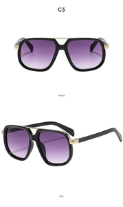 Detail view of double bridge pilot sunglasses with black frame and purple gradient lenses