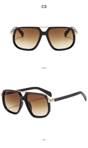 Front and side views of vintage pilot sunglasses with black frames and gold bridge details