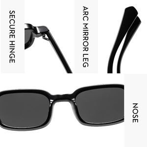 Detail view of secure hinges, arc legs, and nose pads on black rectangular sunglasses