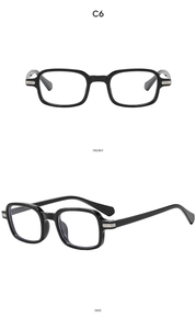 Detail view showing front and side profile of black retro square frame sunglasses