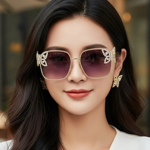 Chic oversized square sunglasses with diamond butterfly accents and gradient lenses