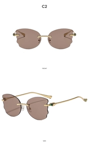 Front and side view of frameless sunglasses with wave-cut lenses and snake-shaped detail